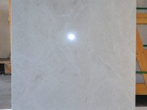 Quen White is Cream Color Natural Marble Tile in Large 36x36 squares.