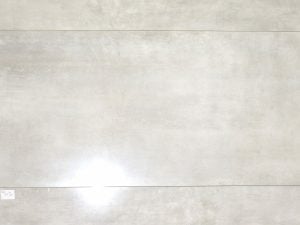 porcelain tile that looks like concrete Milano white in polished finish. Rectified porcelain tile from Italy