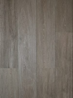 Canada Chestnut is a porcelain tile with wood grains. It looks like wood.