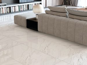 closeup picture of porcelain floor tile with white background and soft grey veining that looks like dolomite installed on living room