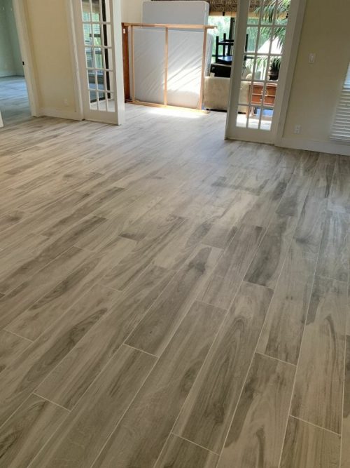 main floor picture showing Bellver Grey wood look porcelain tile installed