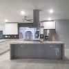 light grey large-format-tile-lithium-pearl-installed-in-an-open-kitchen-concept