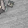 palio grey is a wood look porcelain tile adding concrete elements to the wood style