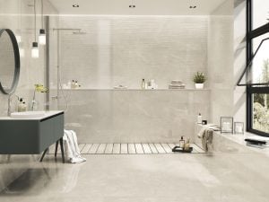 porcelain tile in the 24x48 size in ivory color with silver background with the look of the limestone