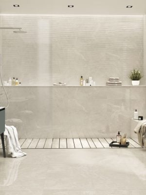 porcelain tile in the 24x48 size in ivory color with silver background with the look of the limestone