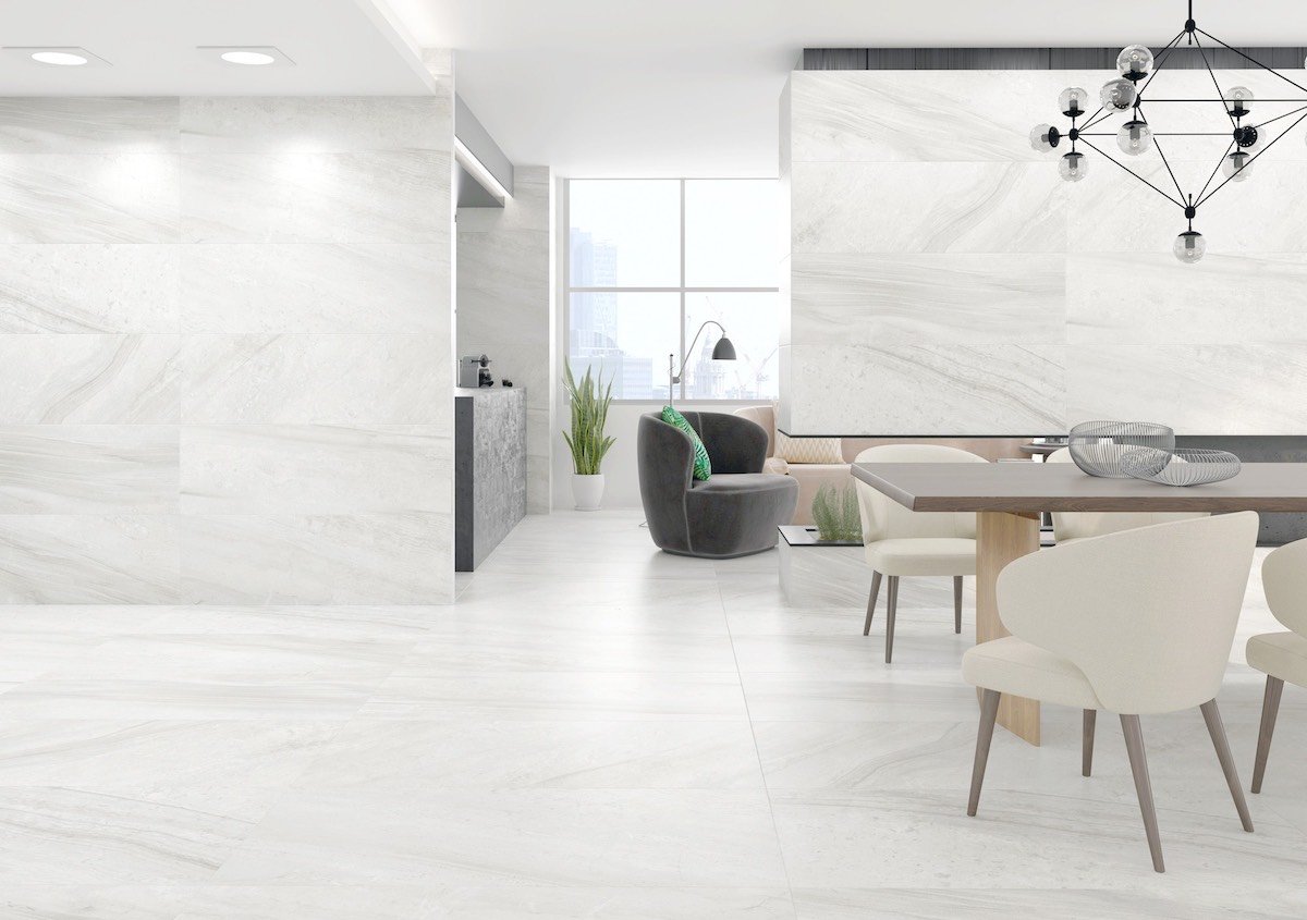 large format very light grey color porcelain tile with the look of limestone in the matte finish.