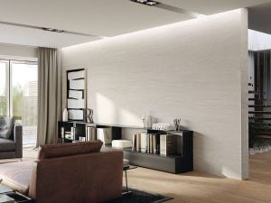 a wall covered with light beige limestone style porcelain tile