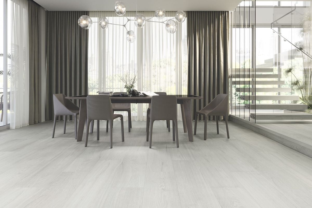 light gray color wood look tile in dining room