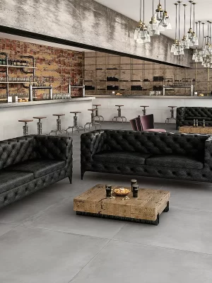 a commercial setting with a gray porcelain tile with the look of concrete floor