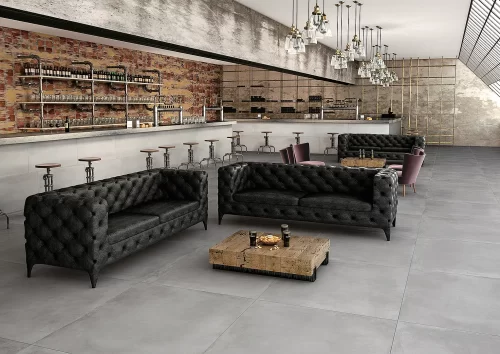 a commercial setting with a gray porcelain tile with the look of concrete floor