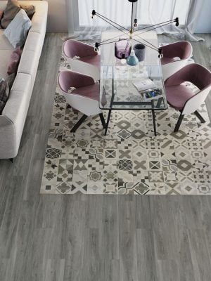 Living and dining area with gray wood looking tile