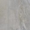 close up picture of Porcelain tile that looks like old wood, whitewashed wood