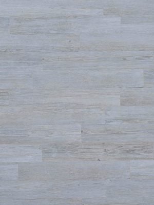 10x60 wood porcelain floors with light gray distressed wood tile on a store front wall