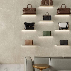 light beige marble style tile as an accent wall