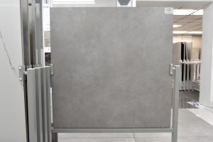concrete look porcelain tile in tile showroom