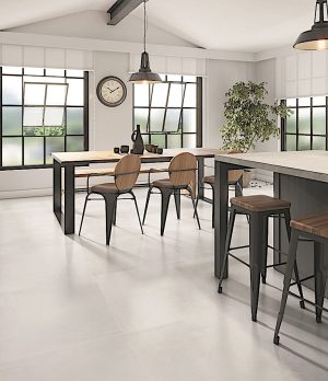 a modern living room floors with a large size, porcelain tile in warm tones with minimal design