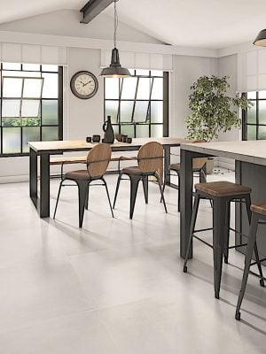 a modern living room floors with a large size, porcelain tile in warm tones with minimal design